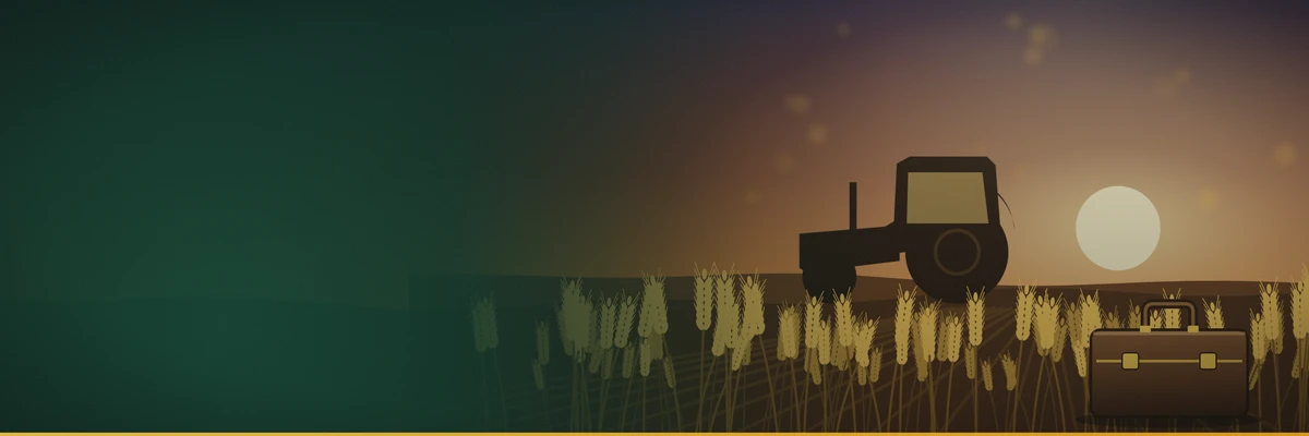 Tractor silhouette on a ridge at sunset above a wheat field, with a brown leather briefcase standing in the wheat at right