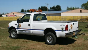 City of Bend Police Services pickup truck parked on a grass lot