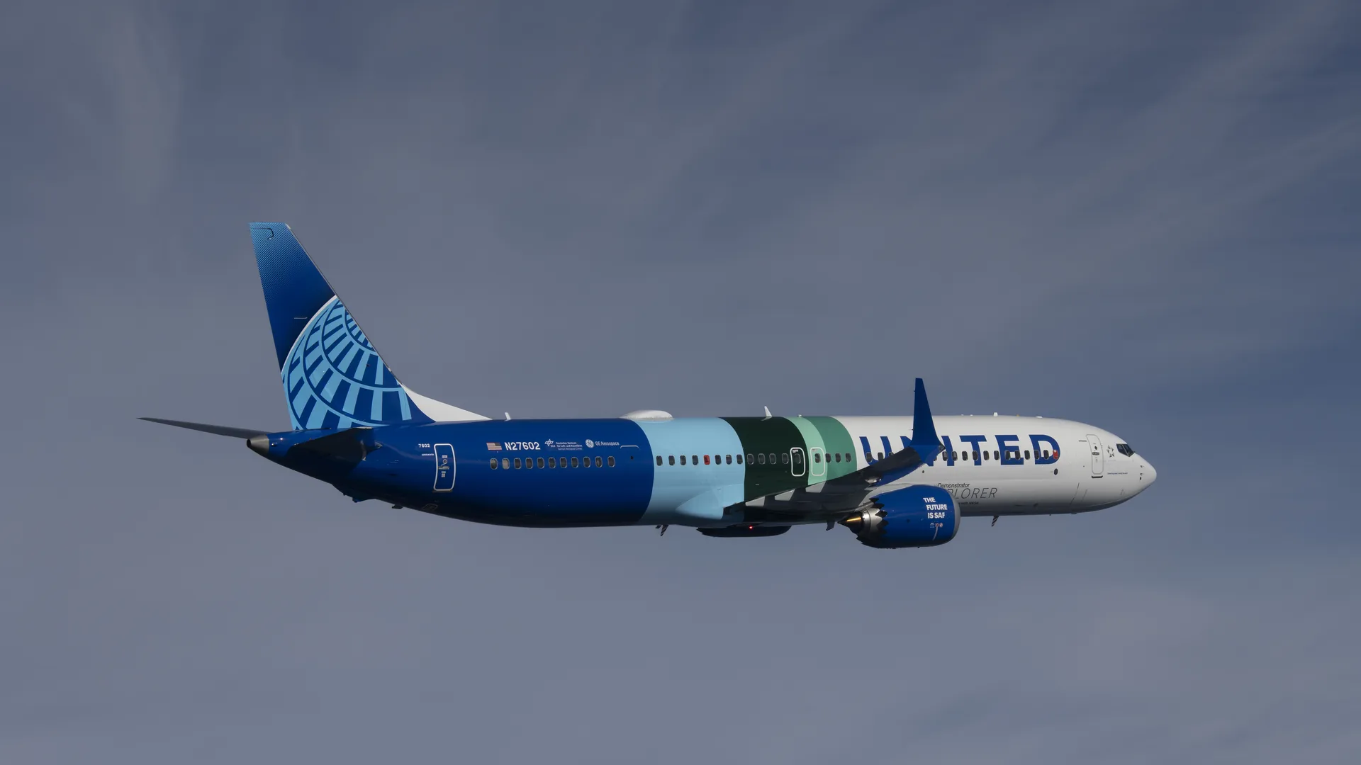 A Boeing 737 MAX 10 test plane in United Airlines colors flies during emissions testing in October 2023.