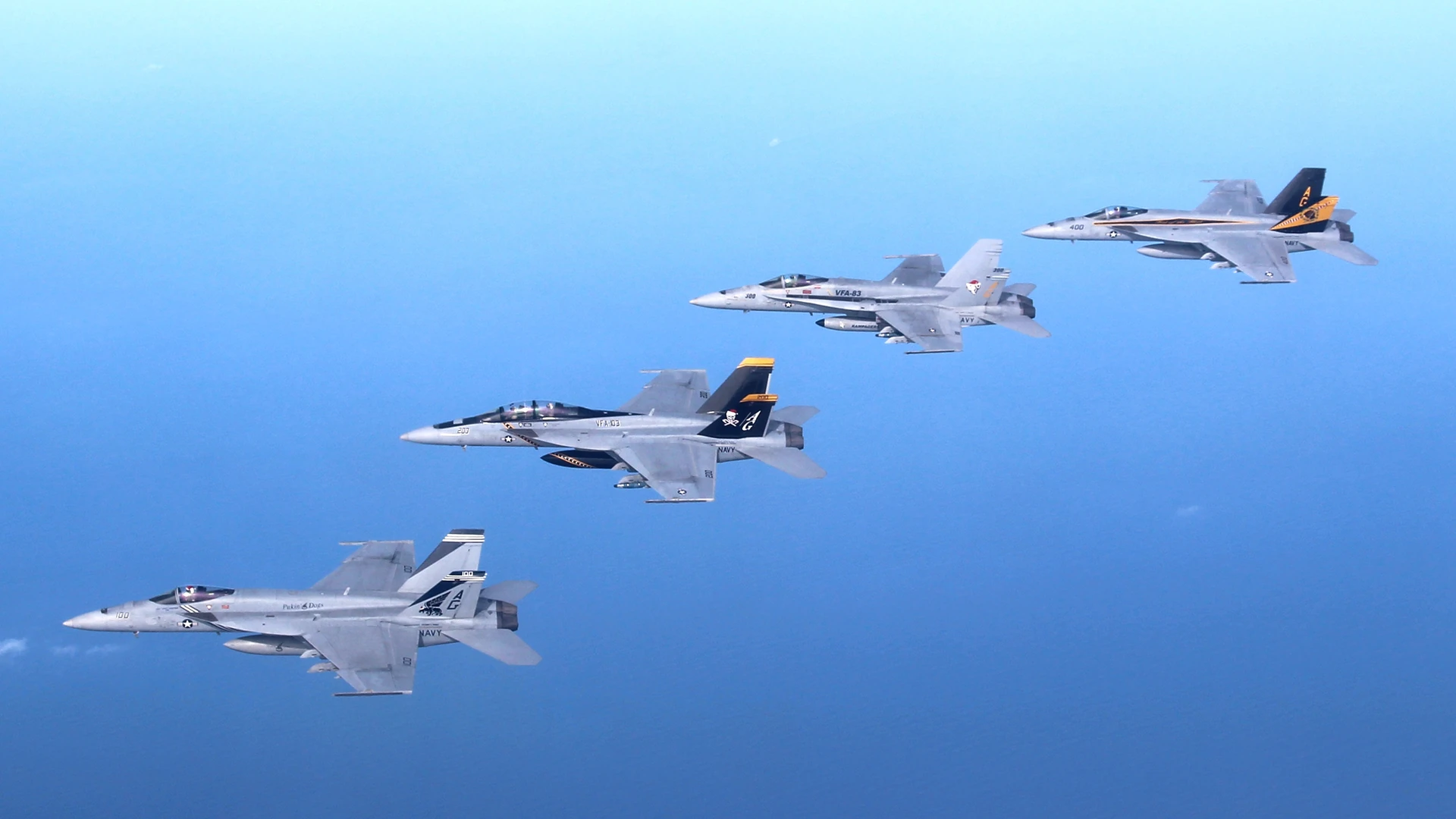 U.S. Navy F/A-18 aircraft flying in formation over the Gulf of Oman