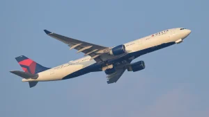 Delta Air Lines Airbus A330-300 climbing after takeoff from Boston
