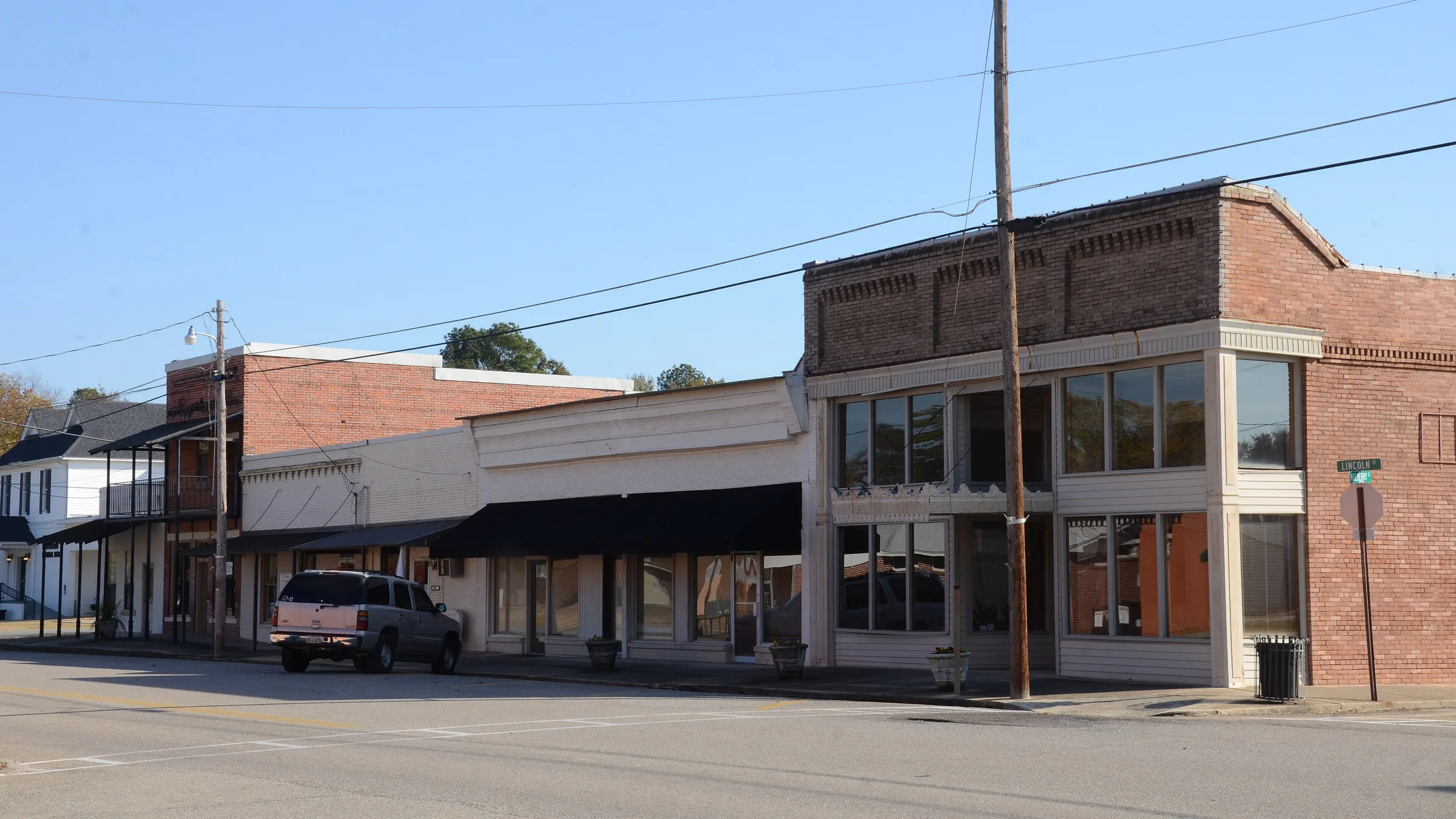 Brick storefronts along a street in the Hamburg Commercial Historic District in Hamburg, Arkansas.