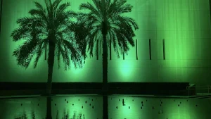 The U.S. Embassy in Riyadh, Saudi Arabia, lit green for Saudi Foundation Day in February 2022.