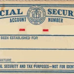 Front of a 1961-version Social Security account number card with the name and number blanked out.