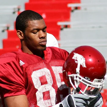 Greg Childs standing on a football field in 2011.