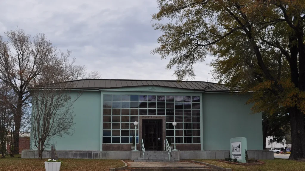 The Crossett, Arkansas, post office, a building with a curved light-green front and large glass windows.