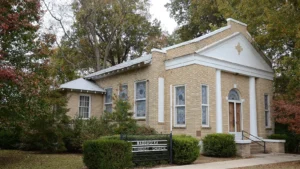 The Wabbaseka Methodist Episcopal Church, South, a light brick church with a white pediment.