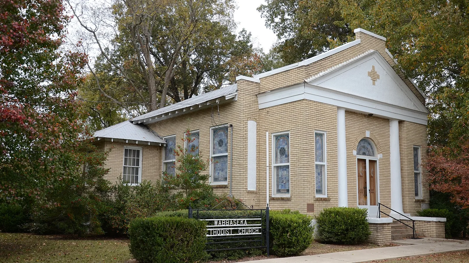 The Wabbaseka Methodist Episcopal Church, South, a light brick church with a white pediment.